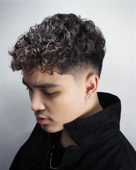 Curly hair fade haircut - Are you tired of your thin hair falling flat and lacking volume? Look no further than short layered haircuts. Short layers can add depth and dimension to thin hair, giving it the a...